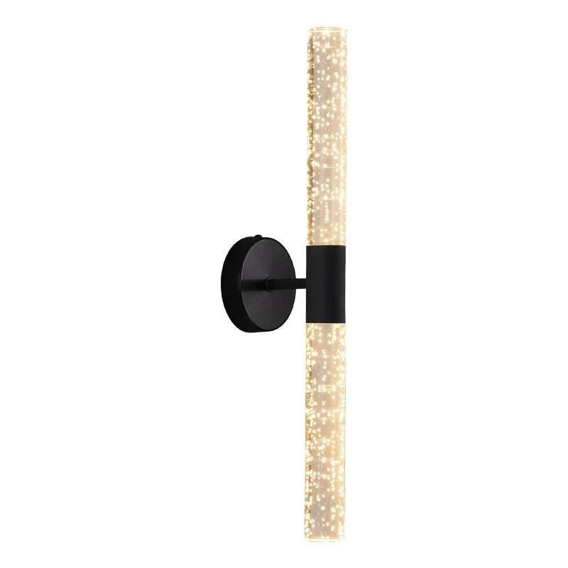 Bubble crystal rod wall sconce in black with a warm white 3000K glow
