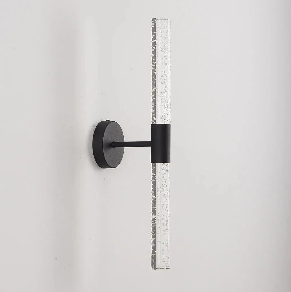 Bubble crystal rod wall sconce in black, unlit, showing the round wall plate