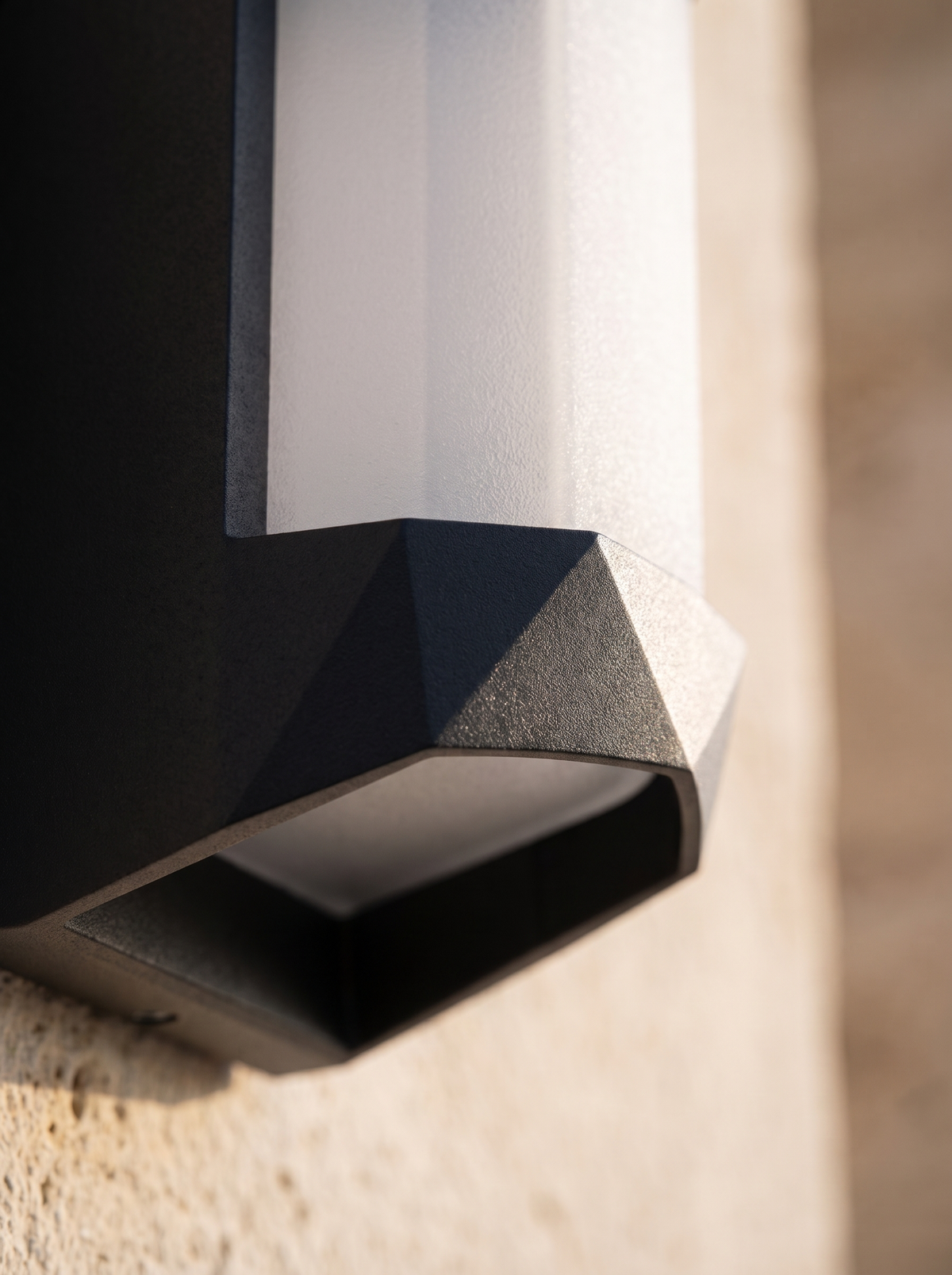 Marve Faceted Outdoor Lamp for Patios with Dual-Beam Glow material close up detail