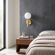 Arden Brass Globe Wall Sconce lifestyle