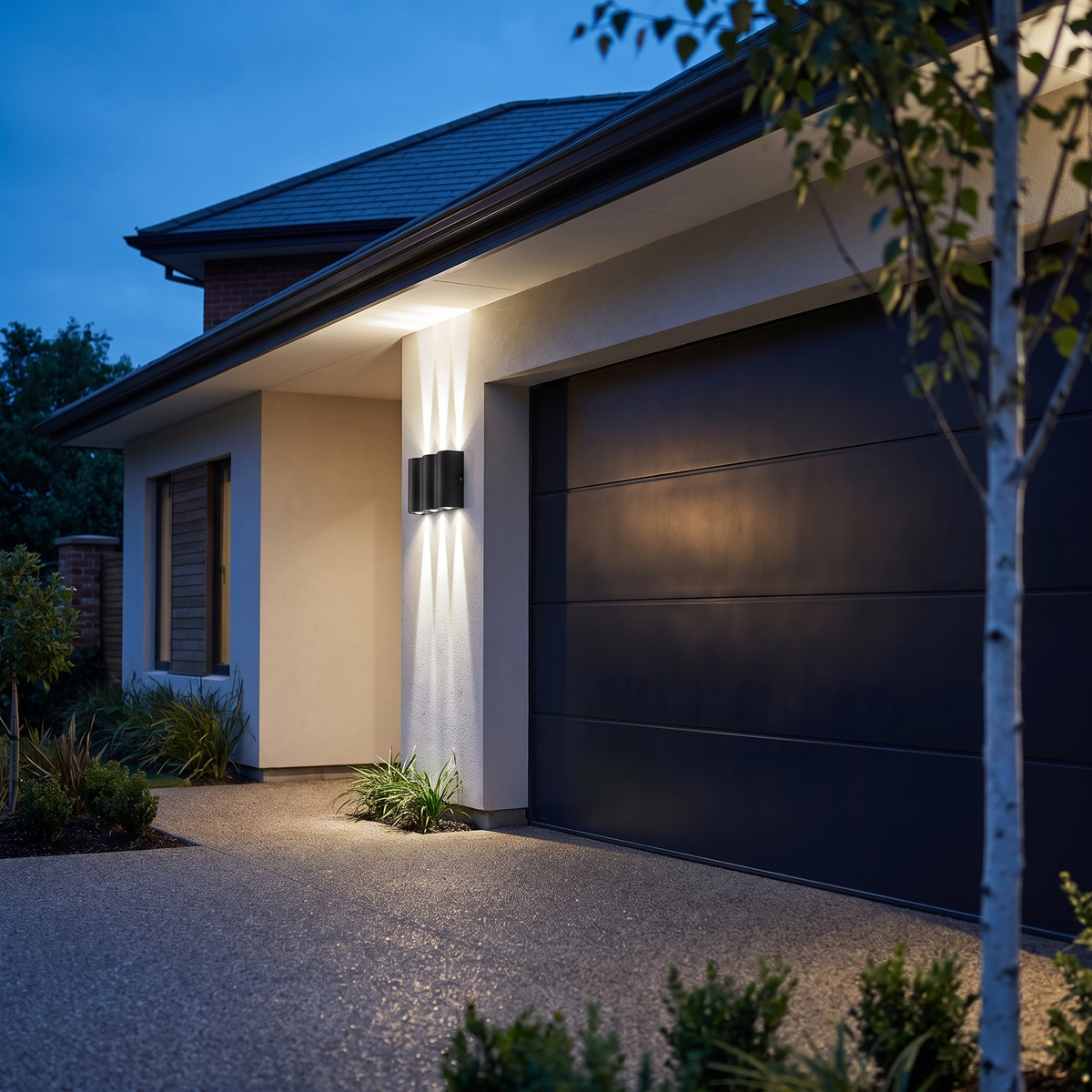 Wavemere 6 Light cool white, beside a garage entrance under deep eaves at blue hour